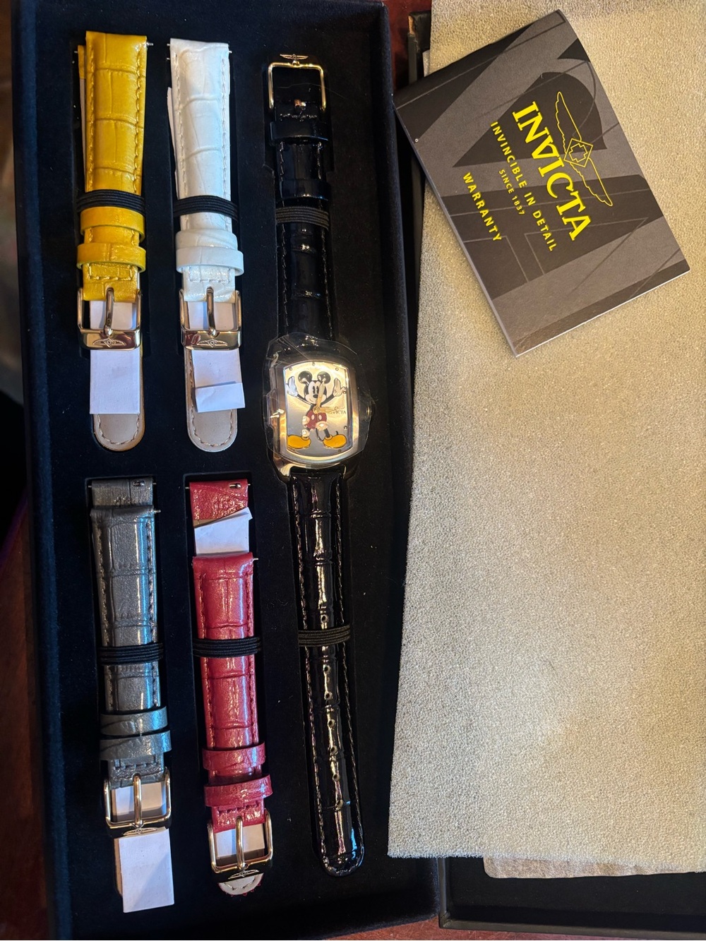 Invicta Men’s Black Watch with Interchangeable Yellow, White, Red, Gray Straps